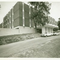 Cars line up in front of Prosser Hall, ca. 1970.