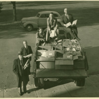 Muhlenberg staff members pose with truckload of stationery to be mailed to servicemen, ca. 1942.