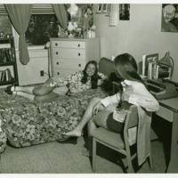 Students talk in dorm room, ca. 1970s.