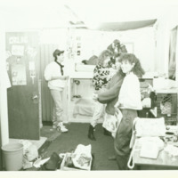 Students talk inside a dormitory, ca. 1980s.