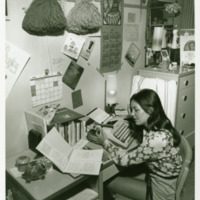 A student studies in a dorm room, April 1971.
